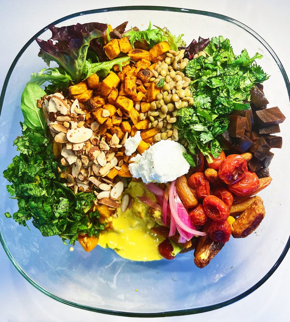 curry roasted vegetable and lentil salad with curry tahini dressing